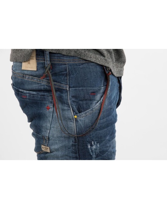 Jeans Damaged σε μπλε απόχρωση σχεδιαστικό, με λάστιχο στο κάτω μέρος